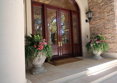 Traditional exterior front door stained wood stone