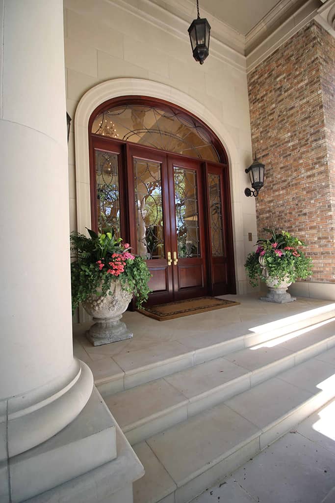 Traditional exterior front door stained wood stone