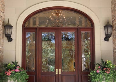 Traditional exterior front view door stained wood stone